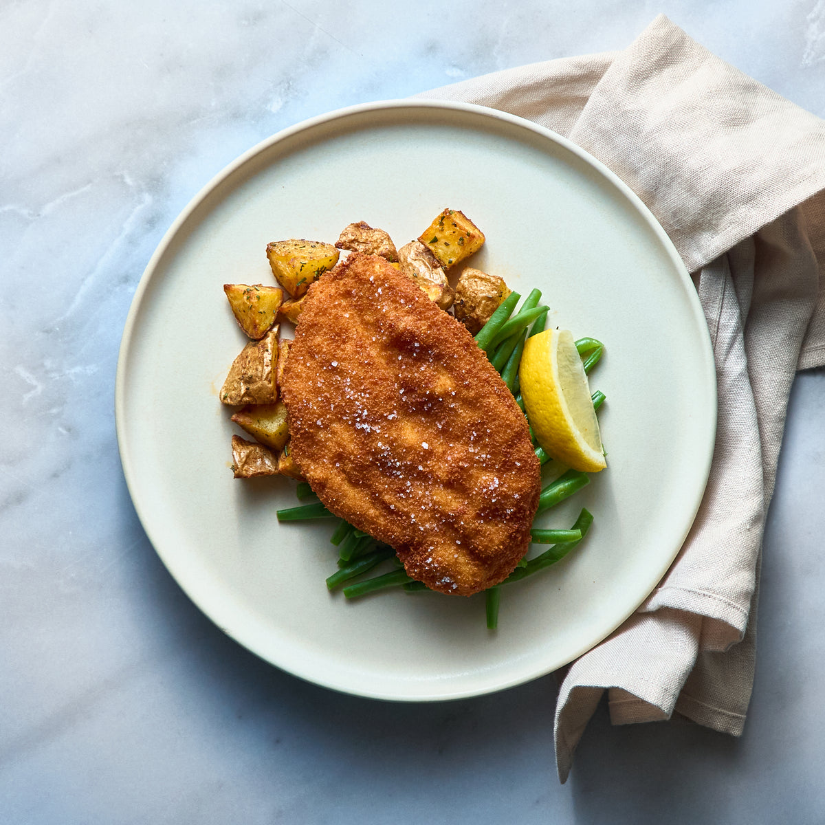 Cotoletta di Pollo con Fagiolini e Patate al Forno
