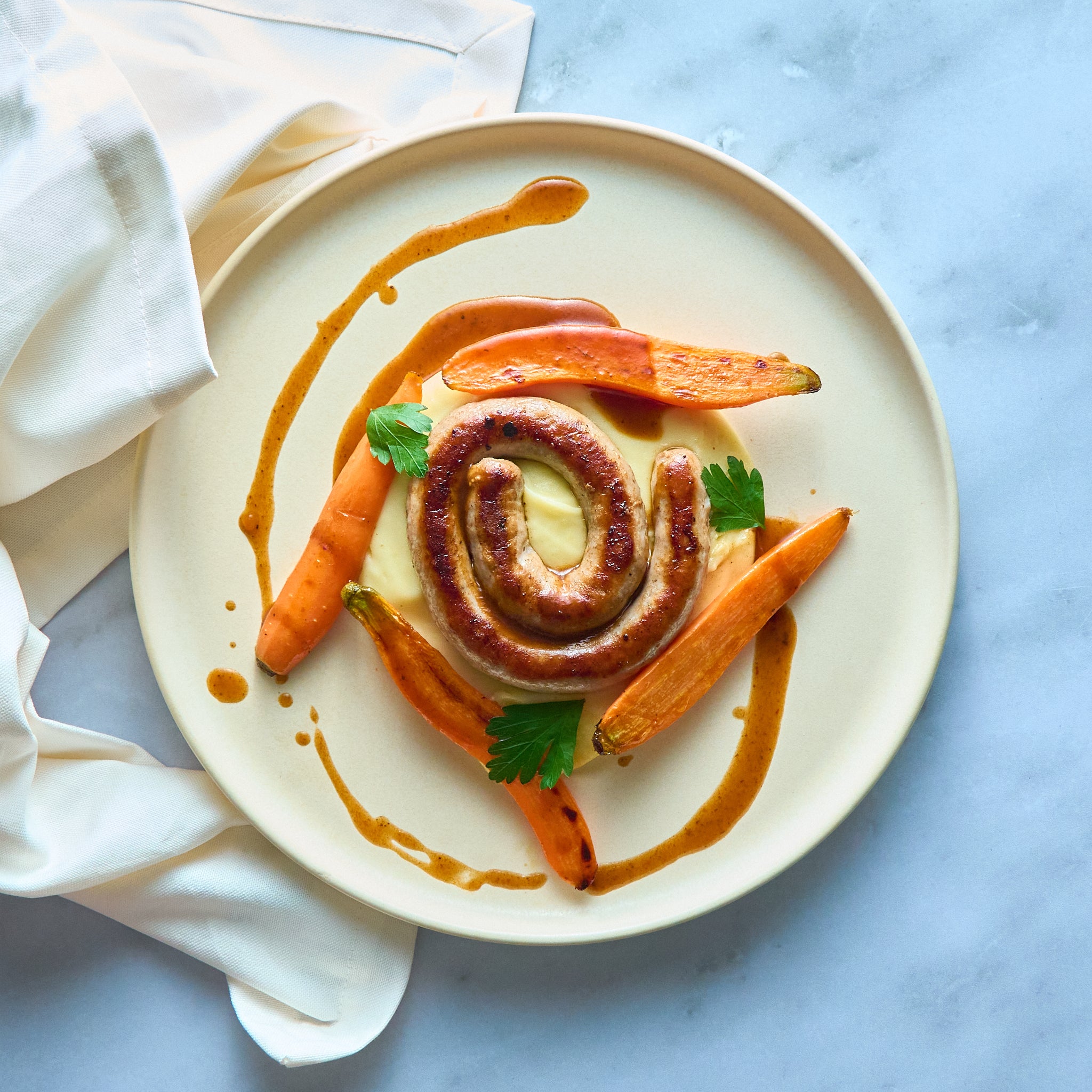 Roasted Sausage with Mashed Potatoes and Glazed Carrots