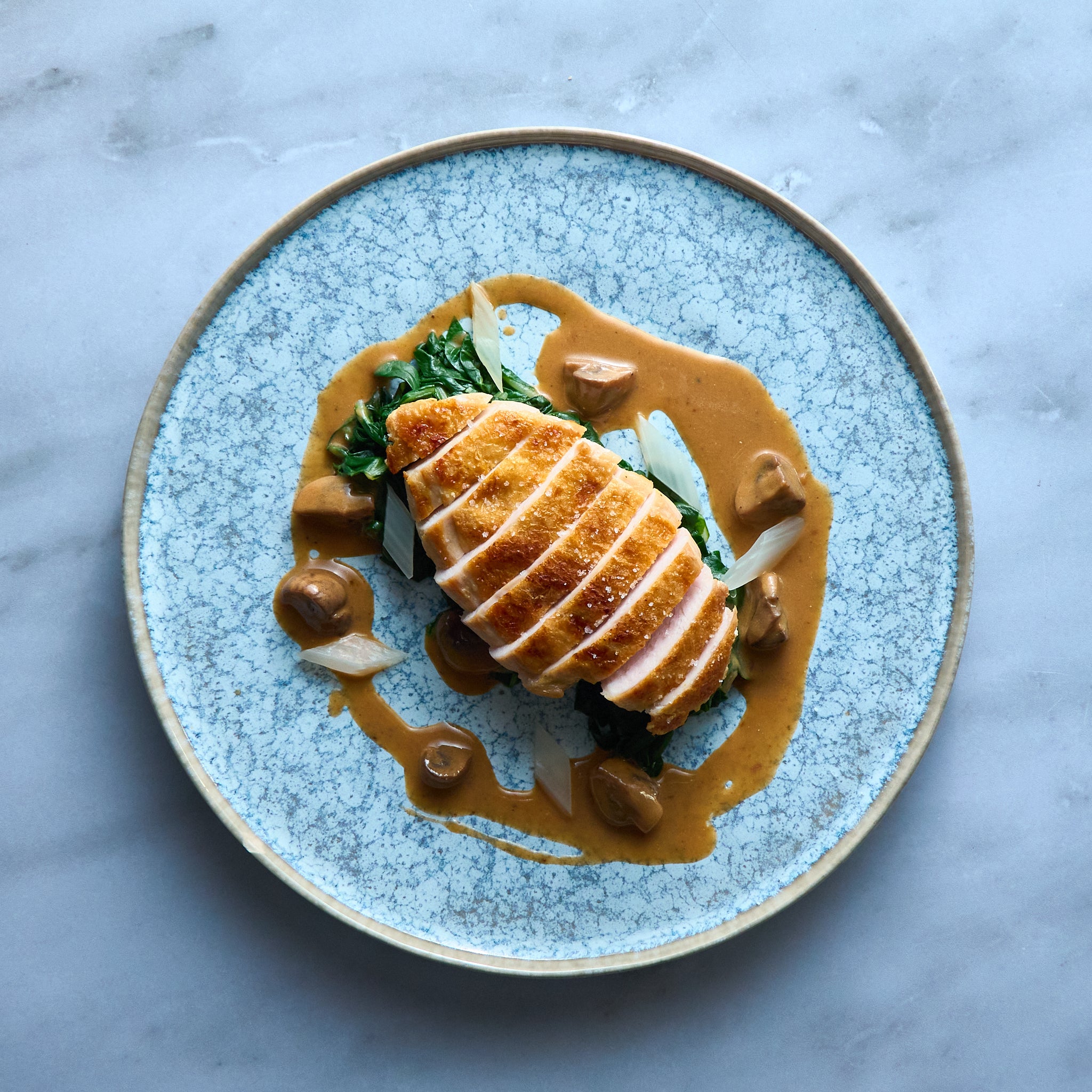 Grilled Chicken Breast with Swiss Chard and Mushroom Sauce