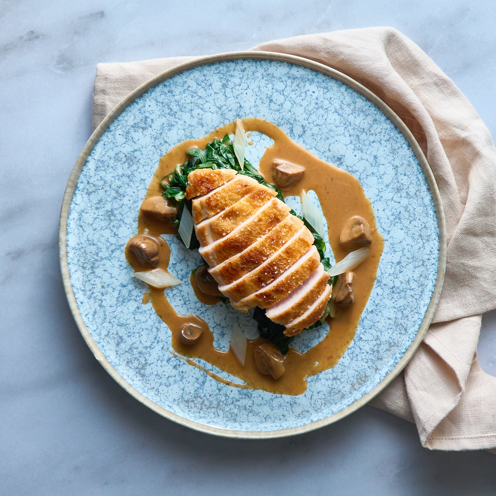 Grilled Chicken Breast with Swiss Chard and Mushroom Sauce