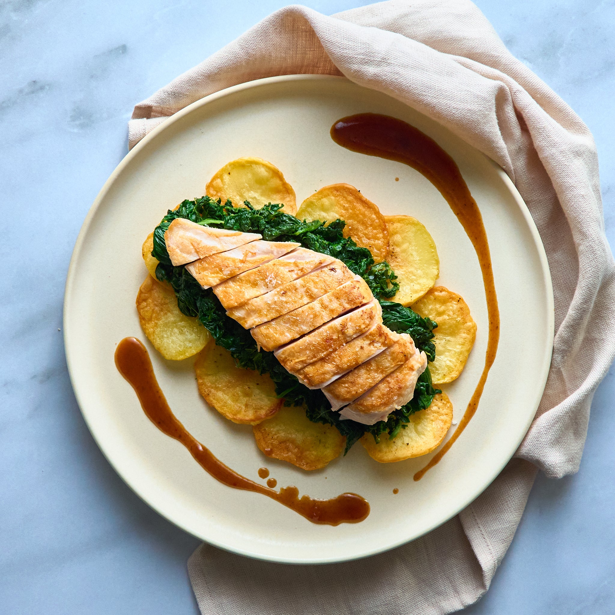 Grilled Chicken Breast with Buttery Spinach and Roasted Potatoes