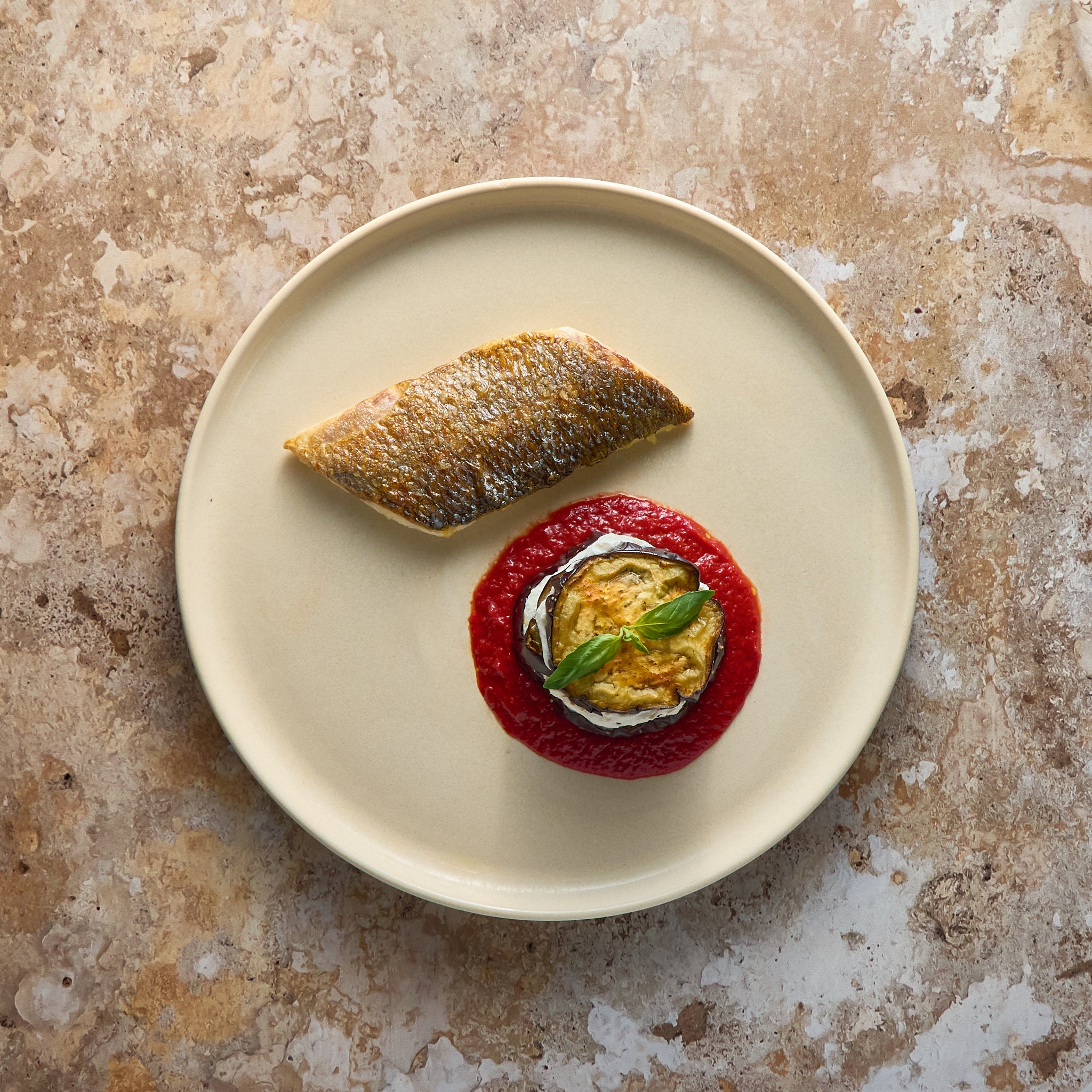 Filetto di Orata con Millefoglie di Melanzane, Ricotta e Salsa di Pomodoro