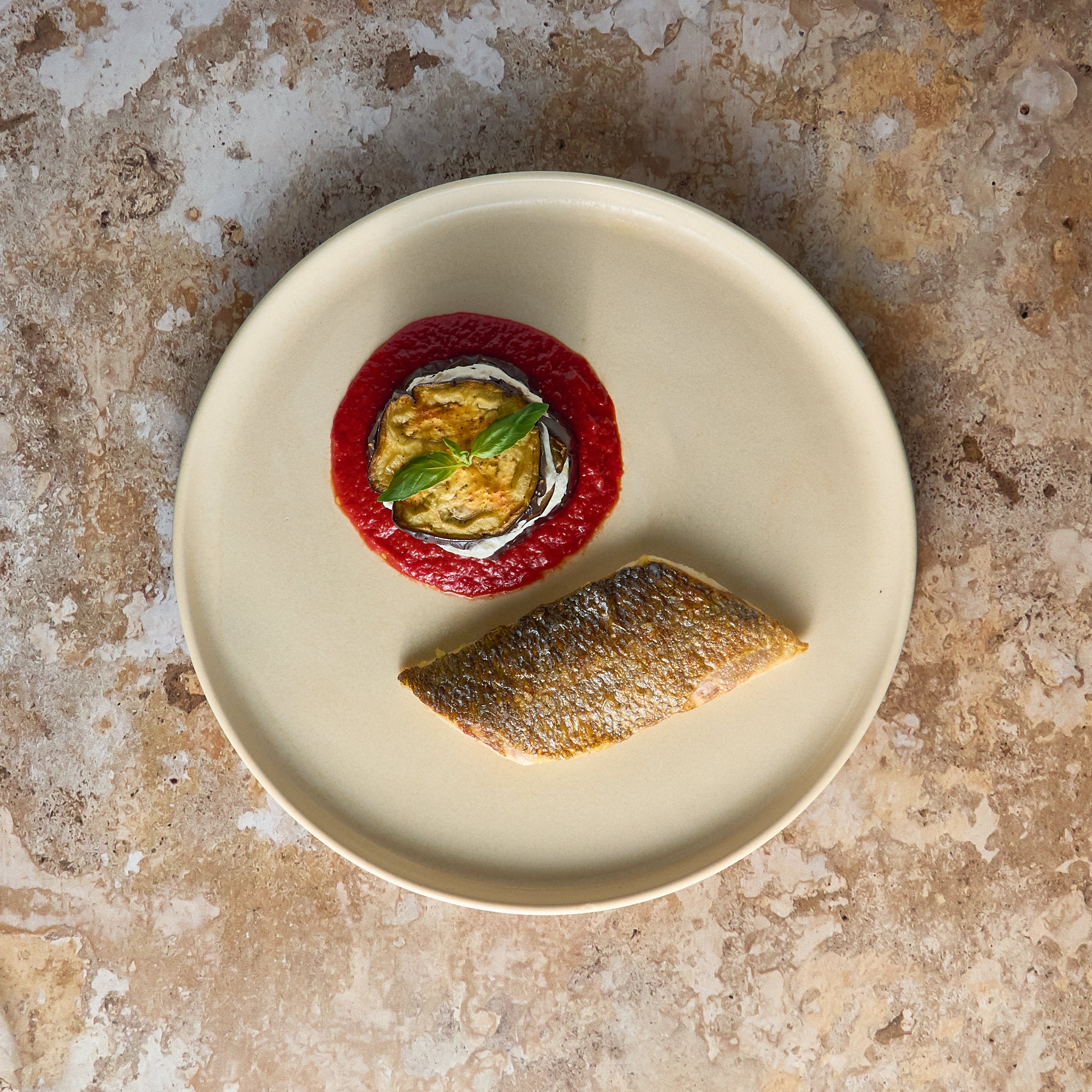 Filetto di Orata con Millefoglie di Melanzane, Ricotta e Salsa di Pomodoro