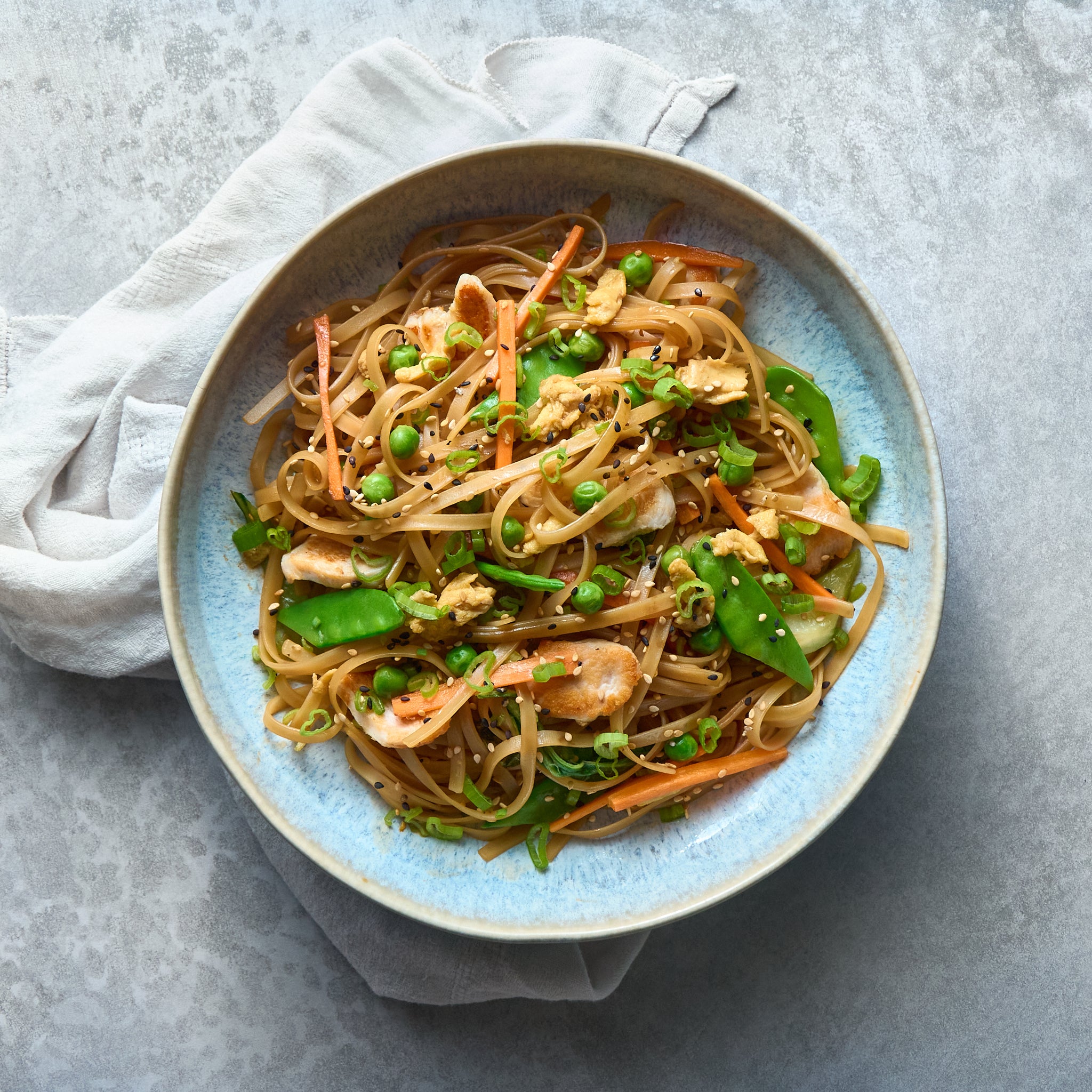 Chicken Pad Thai with Snow Peas, Green Peas, and Carrots