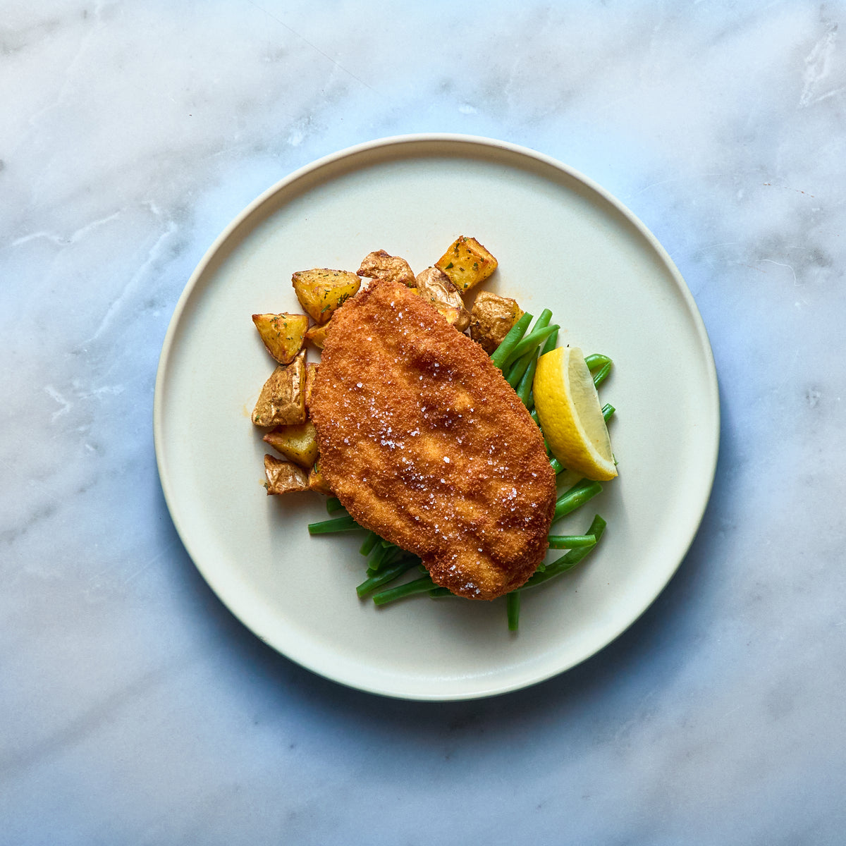 Cotoletta di Pollo con Fagiolini e Patate al Forno
