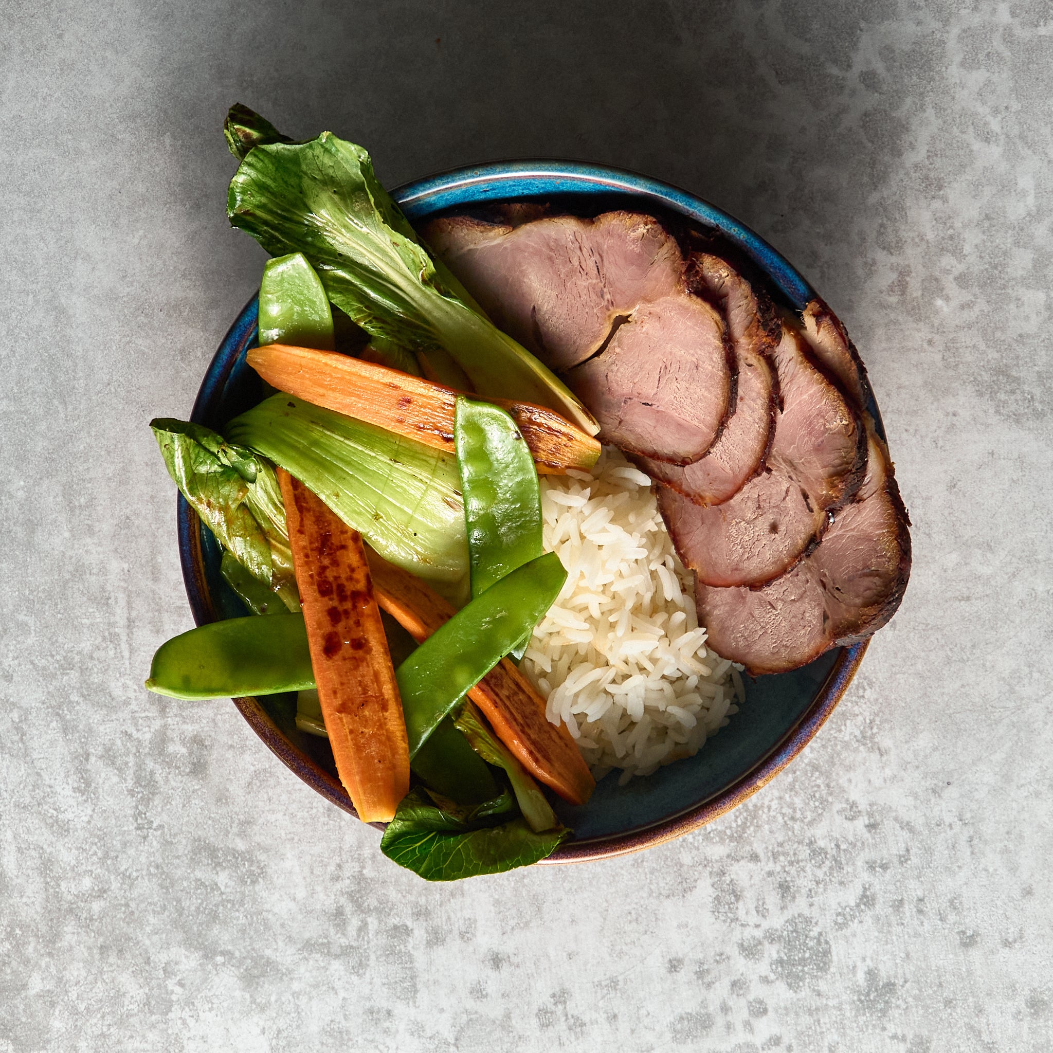 Arrosto di Maiale con Carote e Piselli su Riso