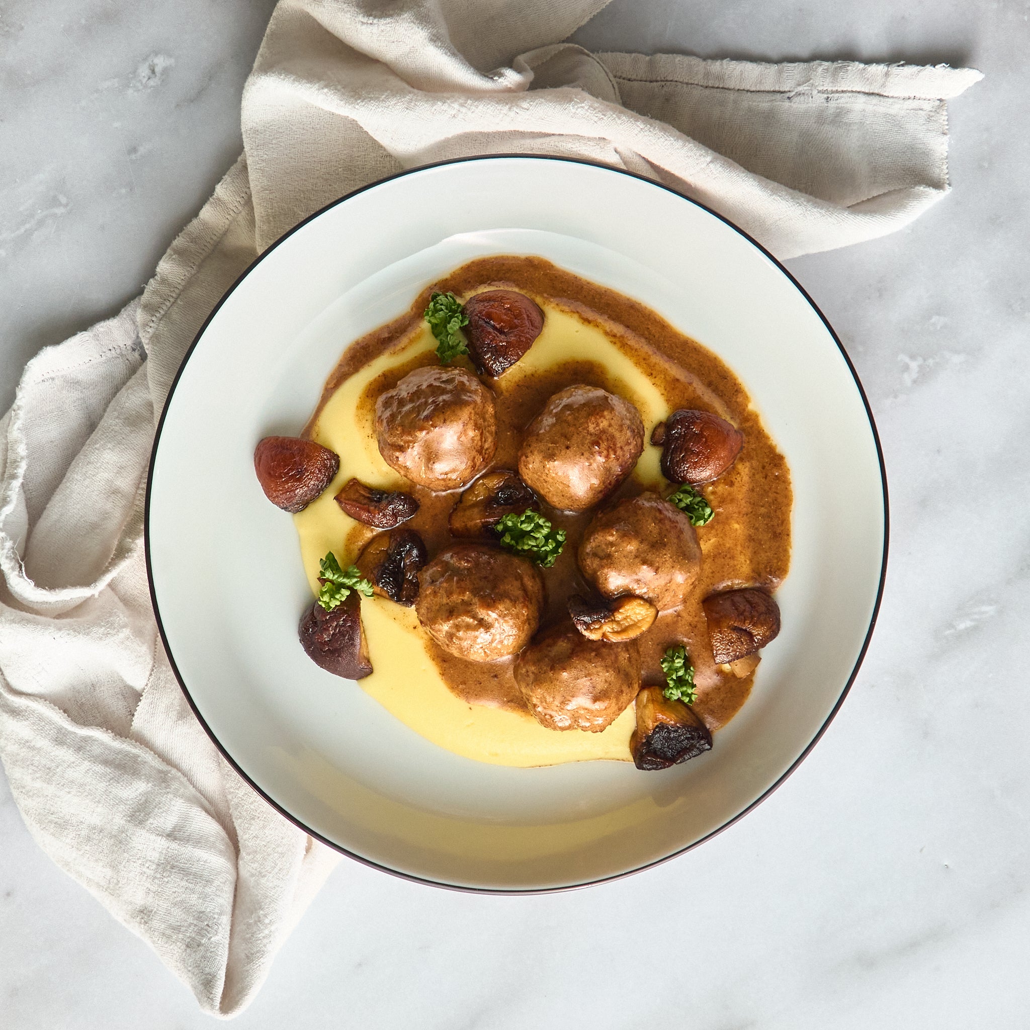 Polpette Svedesi su Purè di Patate Cremoso con Funghi