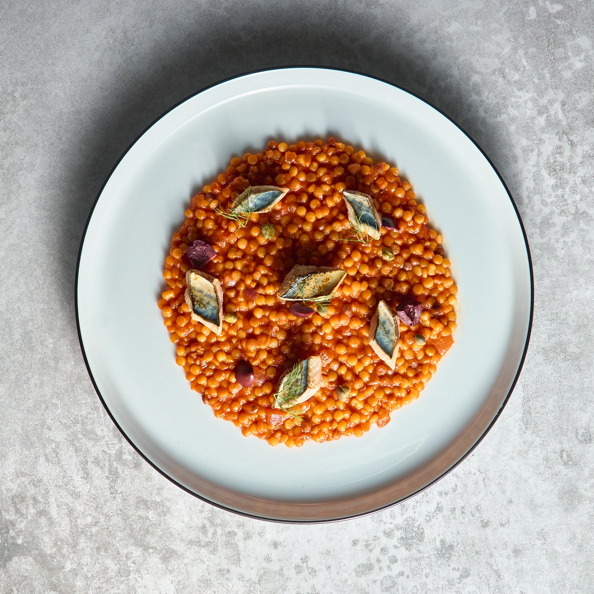 Fregola Sarda alla Puttanesca con Sgombro Grigliato