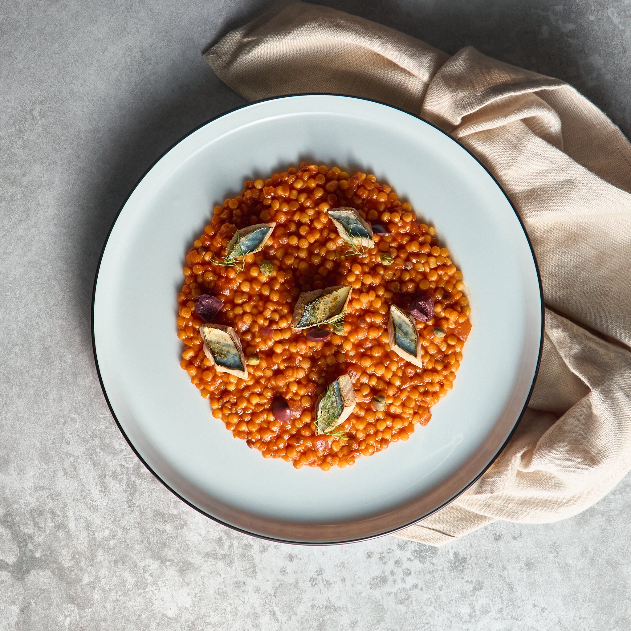 Fregola Sarda alla Puttanesca con Sgombro Grigliato